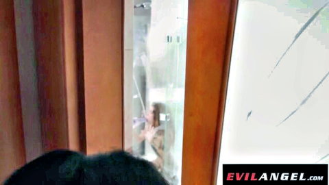 Tattooed brunette in steamy shower ass play before lesbian anal orgy