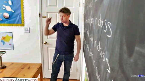 Handsome college teacher gesturing in classroom with chalkboard and maps before hot student sex