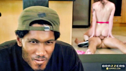 Black guy in green cap smirks as skinny white girl spreads trimmed pussy on kitchen floor