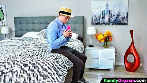 Man in hat holds pink vibrator on bed in step-sister cheating scene