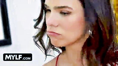 Intense brunette MILF in red top, side profile gaze from Mylf's horny housewives adventure
