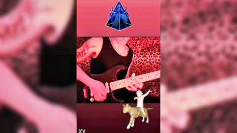Tattooed Italian boy passionately playing rock guitar solo