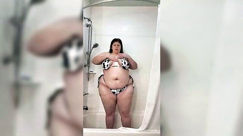 Curvy BBW noturbabymoms as oiled hucow in cow bikini masturbating in shower