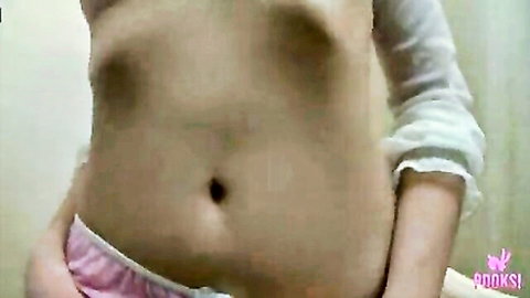 Slim teen lifting white shirt to expose toned belly navel and pink panties