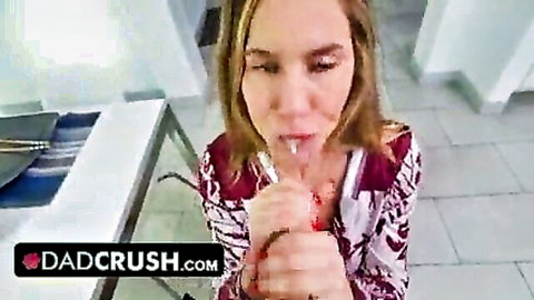 Blonde woman in low-cut dress performing oral in Dad Crush stepdaughter trailer