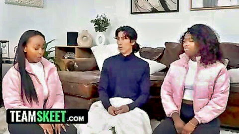 Two sexy Black stepsisters in pink jackets tease dorky Asian stepbrother for taboo threesome