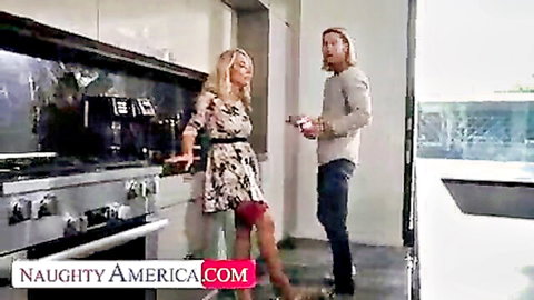 Sadie Summers in floral dress with neighbor in kitchen tease