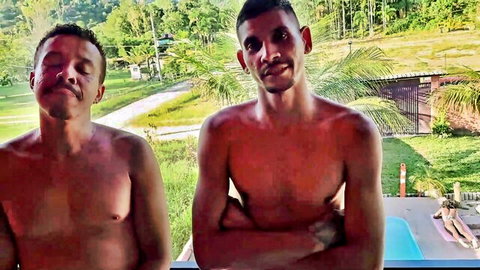 Two shirtless muscular Latino men outdoors by pool in cuckold debt anal threesome thumbnail