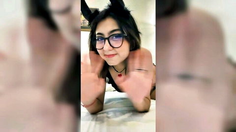 Cute Asian girl with cat ears, glasses in black lingerie, smiling playfully solo