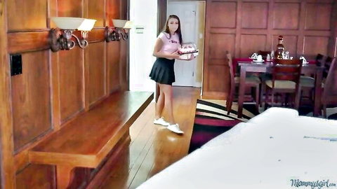 Reena as lesbian stepmom in tight pink tank top and mini skirt, standing seductively