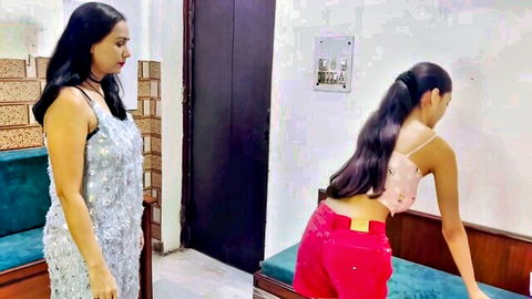 Indian women in sexy outfits, mature babe watches young beauty bend over pink shorts ass tease