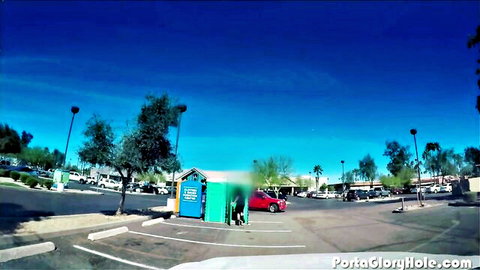 Naughty cougar at portable gloryhole booth in sunny parking lot
