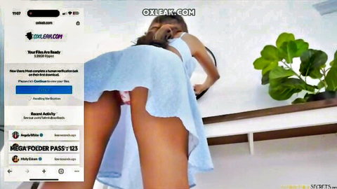 Jena LaRose bent over in short blue dress, exposing big ass