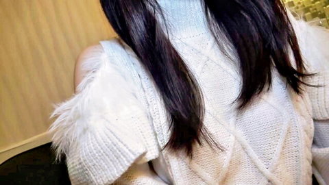 Beautiful Japanese woman with long black hair in fluffy white off-shoulder sweater