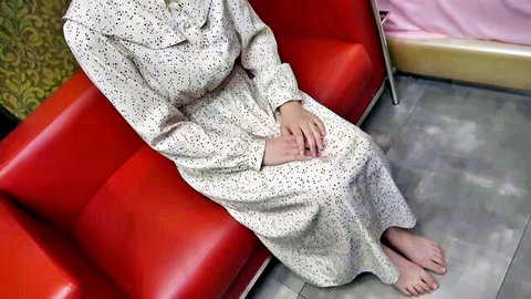 Japanese slender beauty in polka dot dress, pale skin, barefoot pose