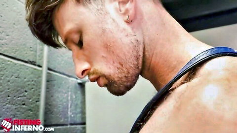 Muscular bearded hunk in leather harness for hardcore bathroom fisting