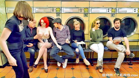 Jasmine Jae topless with big tits in group laundromat scene