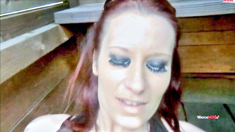 Ivy-Diamond redhead topless smile with blue eyeshadow closeup