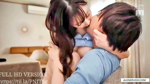 Asian woman with ultra huge tits kissing man intimately on lap