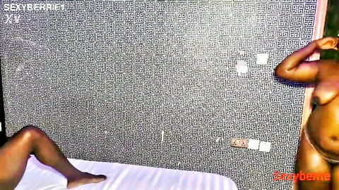 Curvy black BBW nude on bed, legs spread seductively