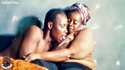 Ebony couple in nude intimate embrace, older curvy woman and younger man during first porn casting