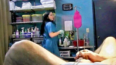 Brunette nurse in scrubs stretches slave's urethra with rosebud sounds