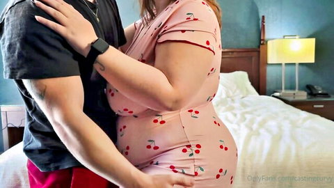 Curvy BBW Ariel in pink cherry dress hugged intimately by lover