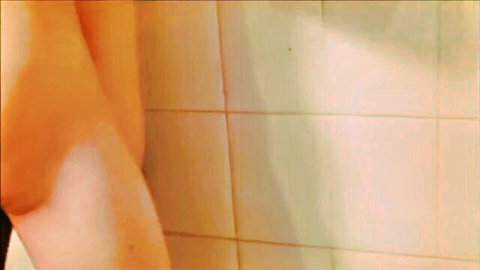 Chloe Night teasing nudity in steamy shower seduction