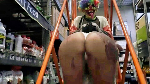 Queen Rogue's big ebony ass exposed in clown outfit bent over ladder