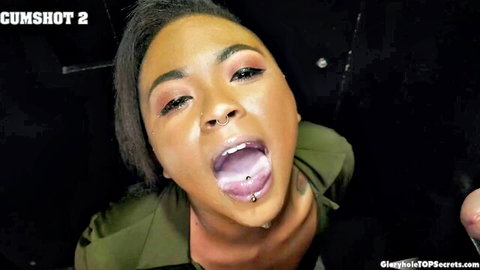 Avery Jane ebony model with dripping cumshot on tongue in close-up POV