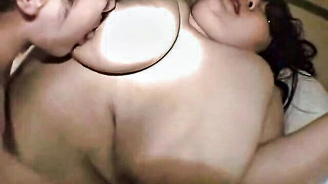 Fat Japanese BBW with huge tits gets breast sucked in bed during sex