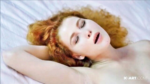 Heidi Romanova redhead nude lying aroused on bed