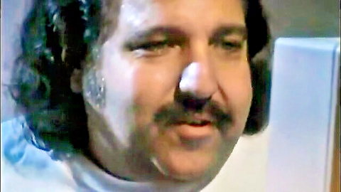 Man with mustache in foamy bathtub scene featuring Ava Vincent, 90s porn action