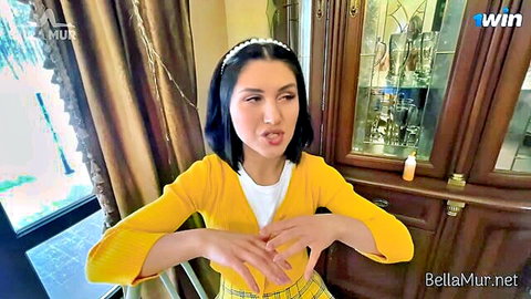 Bella Mur teasing in yellow cardigan and plaid skirt for sexy orgy vlog