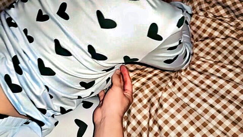 Teen girl's big ass teasingly exposed as heart pajamas pulled down on bed