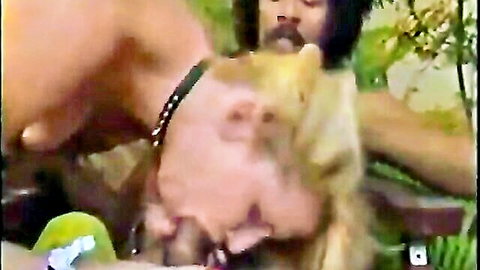 Vintage blonde big tits woman sucks hairy cock outdoors on park bench