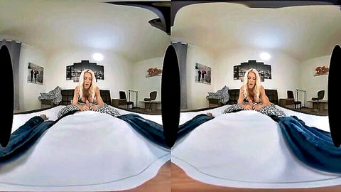 Blonde cutie with big fake boobs in leopard lingerie on bed