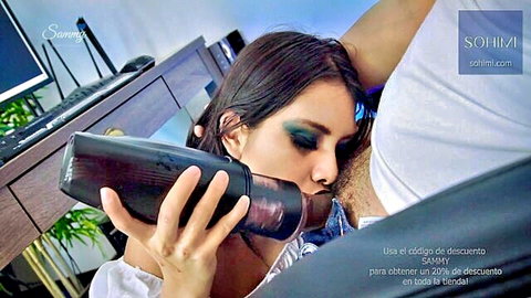 Latina babe with smoky eyes kissing black masturbator sleeve toy on man's arm in office