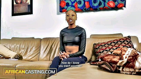 Ebony woman in leather top during African casting job interview