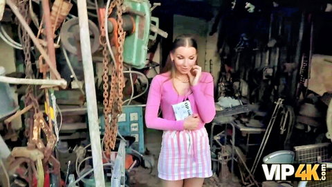 Long-haired blonde in pink top and striped mini skirt with Steve Q