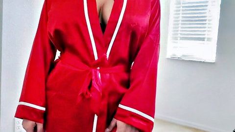 Busty babe in open red satin robe teasing massive tits cleavage