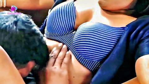 Man gropes busty Indian woman's huge tits in blue striped bra