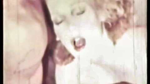 Retro Irish lass close-up oral scene in vintage porn film