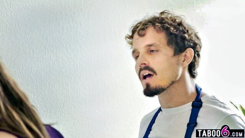 Curly haired man in suspenders speaks intensely to brunette woman in taboo closeup