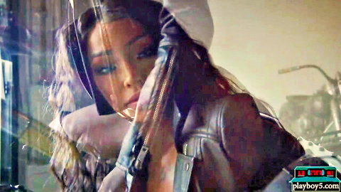 Harley Dean ebony MILF stripping in leather jacket at motorcycle shop