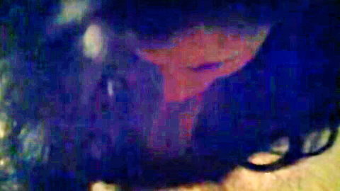 Blurry close-up of brunette giving pity blowjob to friend