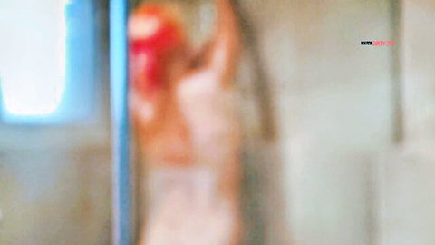 Leonie-Pur naked and wet in steamy shower pose