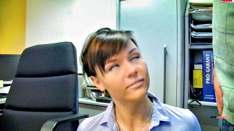 Bibixxx as office slut in blouse, thoughtful pose
