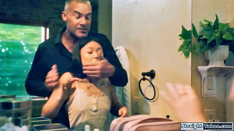 Older man grabs young Asian woman's hair from behind in steamy bathroom taboo encounter