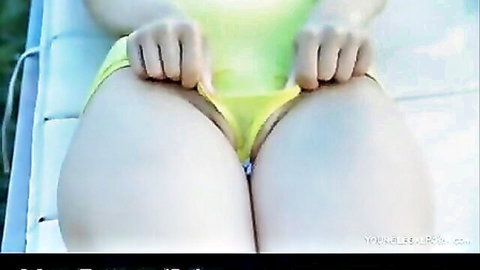 Shy blonde teen exposing pussy outdoors in yellow bikini